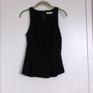 Black peplum blouse w detail front & zipper back